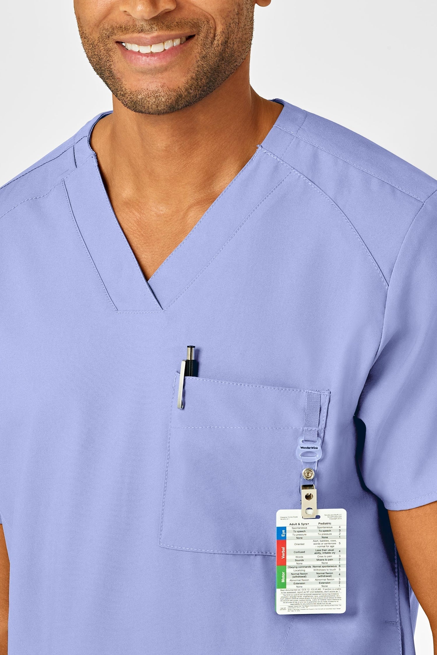 Top de tenue médicale bleu ciel avec poche et insigne pour homme, modèle W123